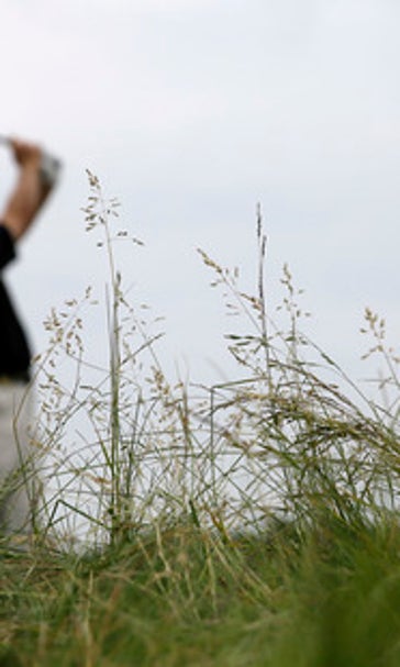 The Latest: Weather suspends play for the day at US Open